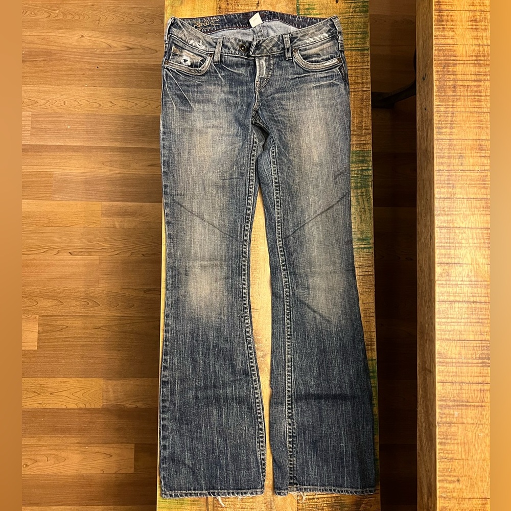 Silver JEANS co. Distressed boot cut jeans 27
